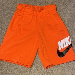 Orange Nike shorts